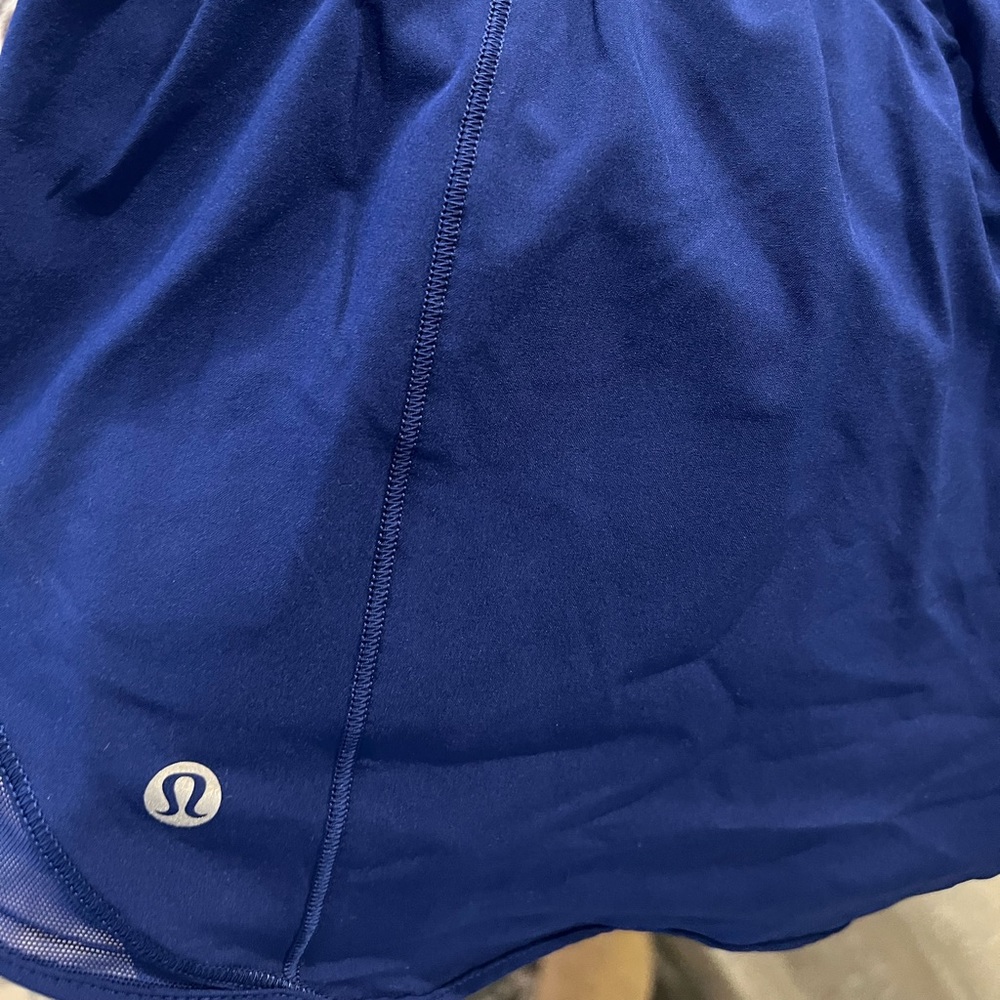 Size 12 new without tags, bright blue LULULEMON shorts 4” length, lined
